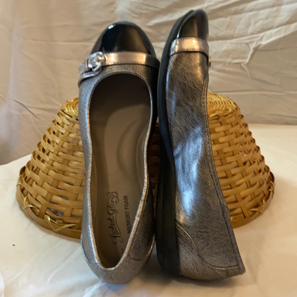 Metallic silver flats with black patent toe